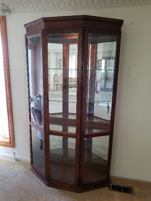Lighted 3 Panel Curio Cabinet with Glass Shelves  http://www.ctonlineauctions.com/detail.asp?id=701618