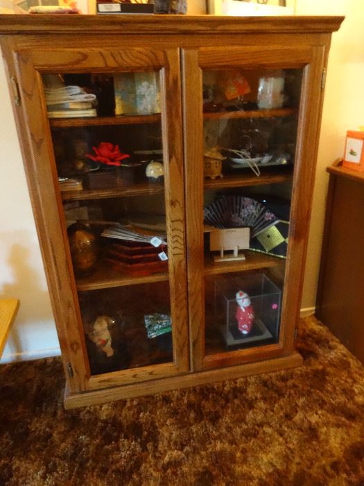 Glass door bookcase or china cabinet.