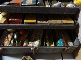 There are some vintage lures and fishing gear remaining.