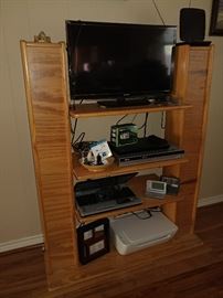 flat screen tv, shelf, bookcase, electronics