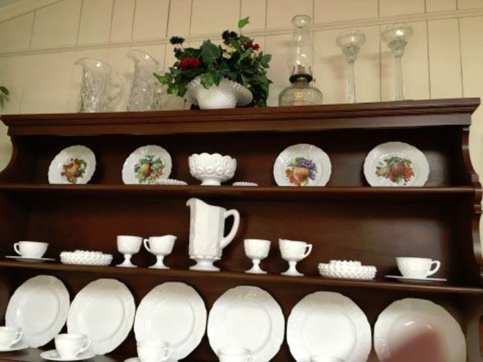 Additional Milk Glass pieces include 2 sugar/creamer sets; Pitcher; candy dish (lid in cabinet) and 2 small and 2 large nut bowls, perhaps ashtrays; Flower Basket with handle. 