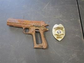 Police Badge and Gun