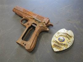 Police Badge and Gun