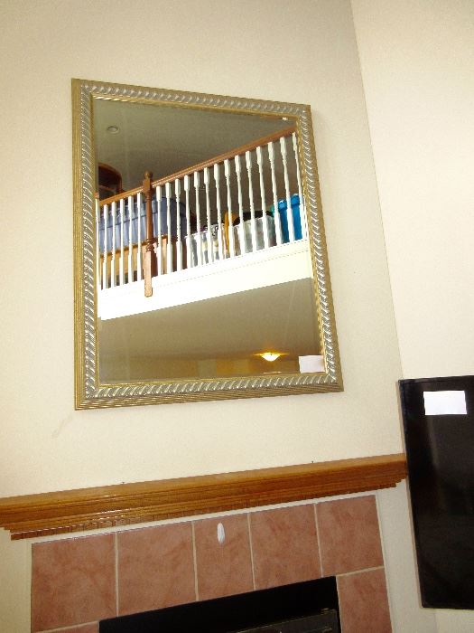 very large beveled glass mirror, no, the ladies and I will not jump up and get it down for you