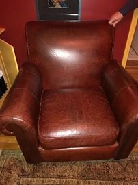 DISTRESSED LEATHER CHAIR AND OTTOMAN
