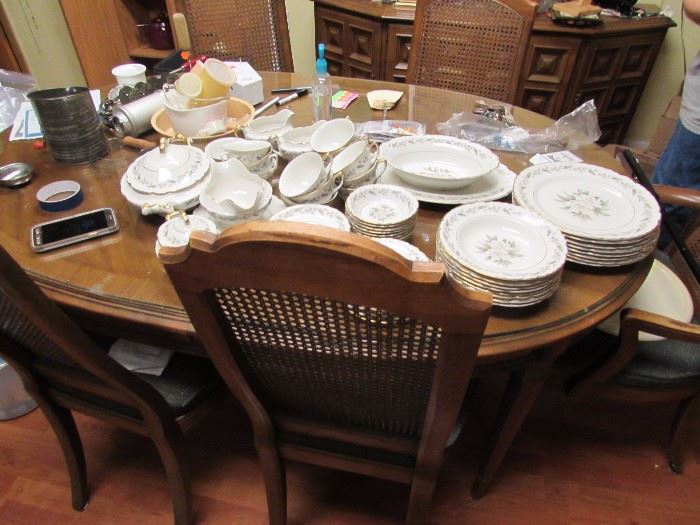 Dining room table and chairs.  Wedding china