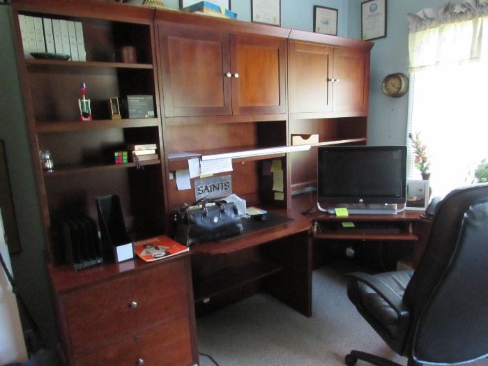 Large Mahogany, high quality desk unit.  You move it.