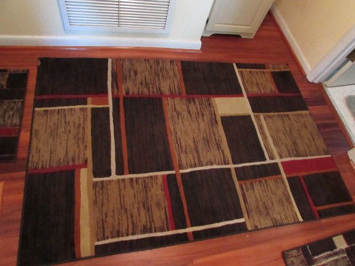 Three matching area rugs