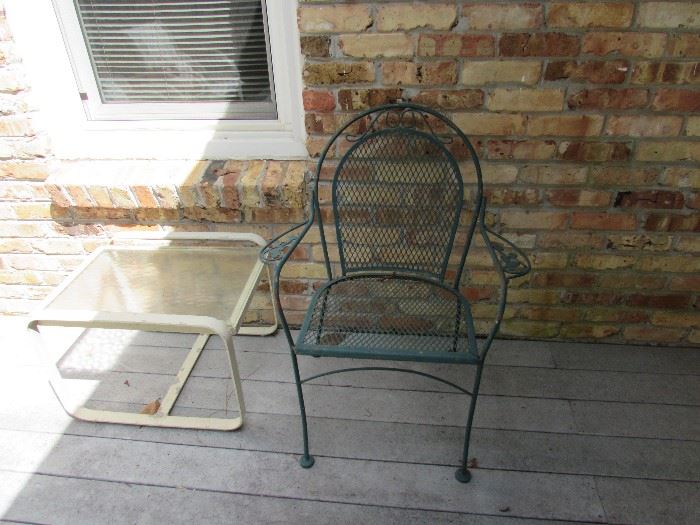 Green wrought iron chair