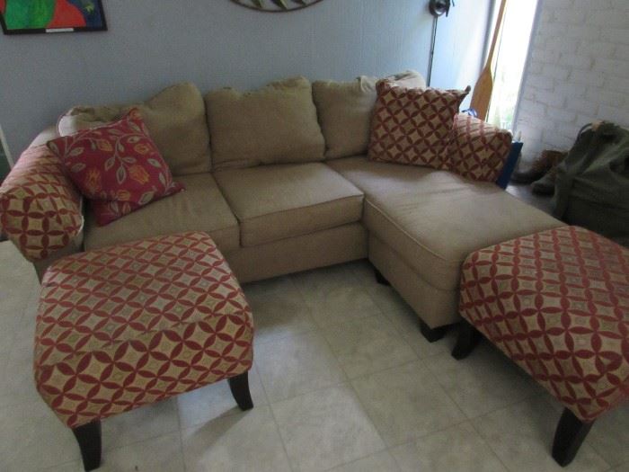 Sectional living room sofa and ottomans
