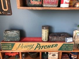 Penny Pitcher game, Metropolitan Life Ins. Co. tin, Edgeworth Extra High Grade Plug Sluce tobacco tin, National Mazda Automotive Lamps tin, Ramon’s tin, Revelation Smoking Mixture tin, Steero Bouillon Cubes tin.
