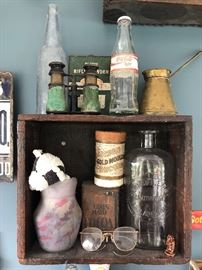 Antique binoculars, antique eyeglasses, antique Philadelphia Apothecary bottle, Quaker Maid Cocoa box, DuPont Rifle Powder tin, Coca-Cola Light bottle, Edison Gold Record Cylinder 