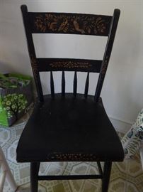 Old hand painted chair. One of two.