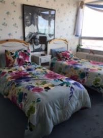 Twin Beds with Headboards and Night Stand. Bedding is also available.