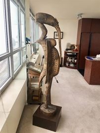 African Senufo Hornbill Bird, Side View. Over 6 ft tall. A pair. COA provided. Written estimate and provenance provided.