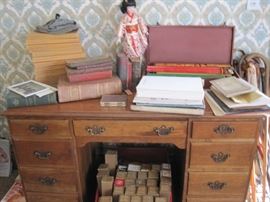 desk, Hemmings magazines,  some local books