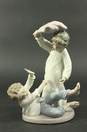 Lot 42: Nao by Lladro Porcelain Figurine "Pillow Fight"