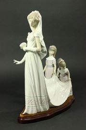 Lot 56: Lladro Porcelain Figurine "Here Comes the Bride"