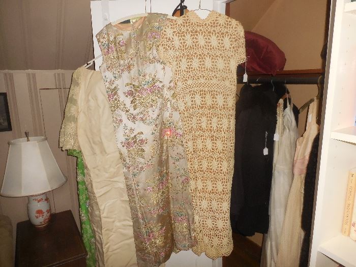Silk, knit vintage dresses.  As well as 2 wedding dresses and beautiful lace long mantle