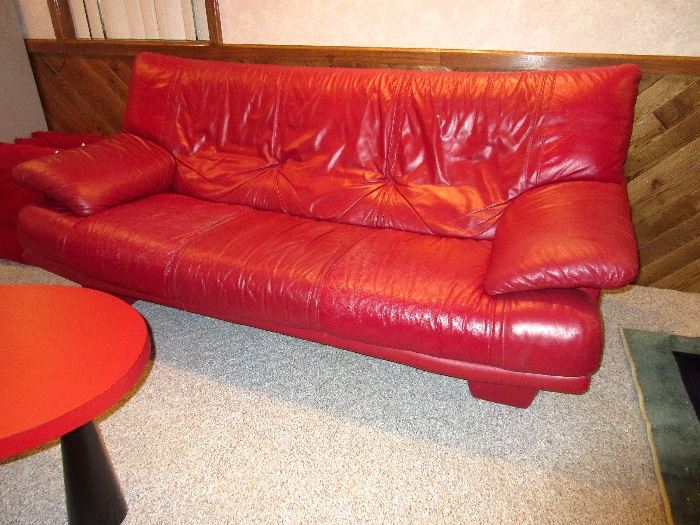 Red Italian leather sofa, delightful