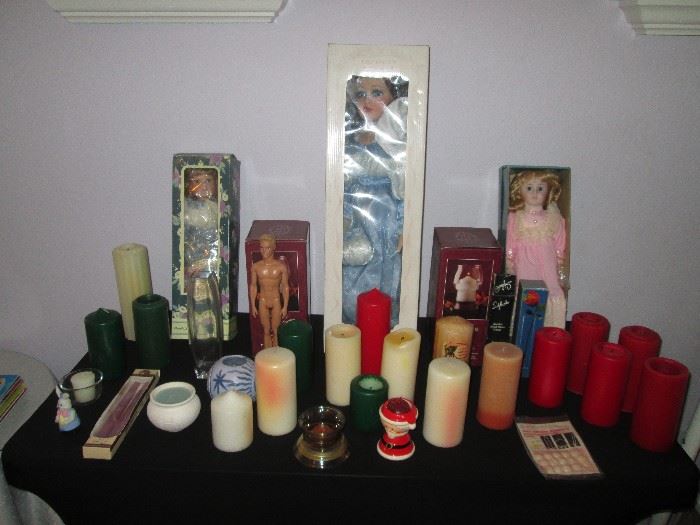 Assorted Candles and several Dolls in Boxes