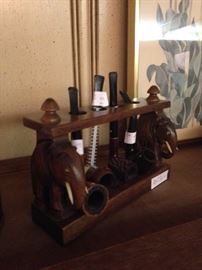 Elephant carved pipe holder