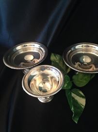 Several sterling bowls