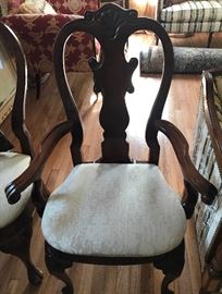 One of six (two arm and four side) dining chairs