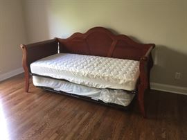 Cherry sleigh bed with trundle