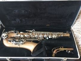 One of 2 saxophones