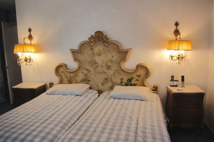 Stenciled Headboard with Pair of Nightstands and Wall Sconces