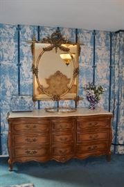 Marble Topped Triple Dresser with Mirror and Vanity Tray and Decorative Vase and Park