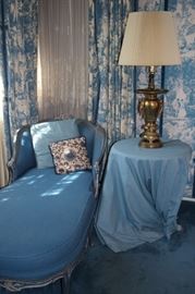 Blue Chaise with Accent Pillows with Table Round and Vintage Brass Lamp