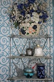 Corner Shelving Unit with Decorative Jars and Floral Arrangement in Basket