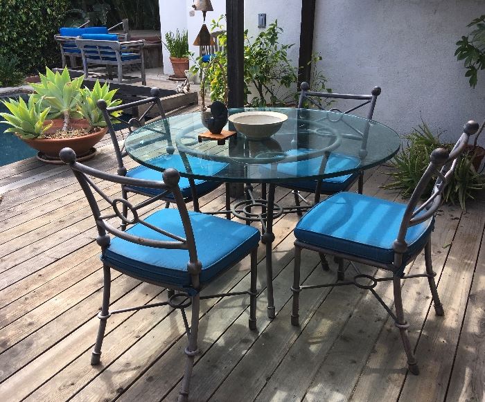 Etruscan Style Patinated metal Table & Chairs; Teak seating; Potted Plants; Garden delights