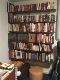 Books, foot stool, golf clubs, two fans and suitcases