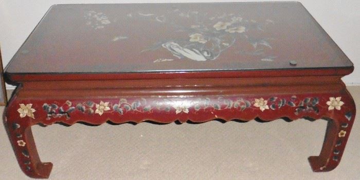 Red lacquer Coromandel coffee table. Repaired.
