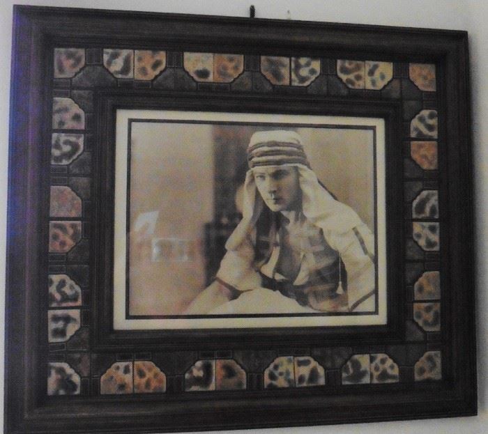 Wood and tile framed Rudolph Valentino photo.
