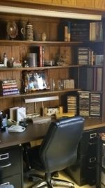 Overview of part of the office with vintage desk lamp, collection of lighthouses, CD's, vintage stein, Lenox Bighorn Sheep 