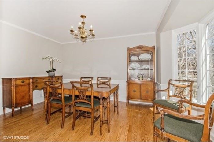 Beautiful vintage dining room set.  Futique - The Antique of the Future by the Saginaw Furniture Company.  Selling as a set: Buffet with great storage, table (in wonderful condition) with 3 leaves and 6 chairs, and beautiful china cabinet with gold accents.