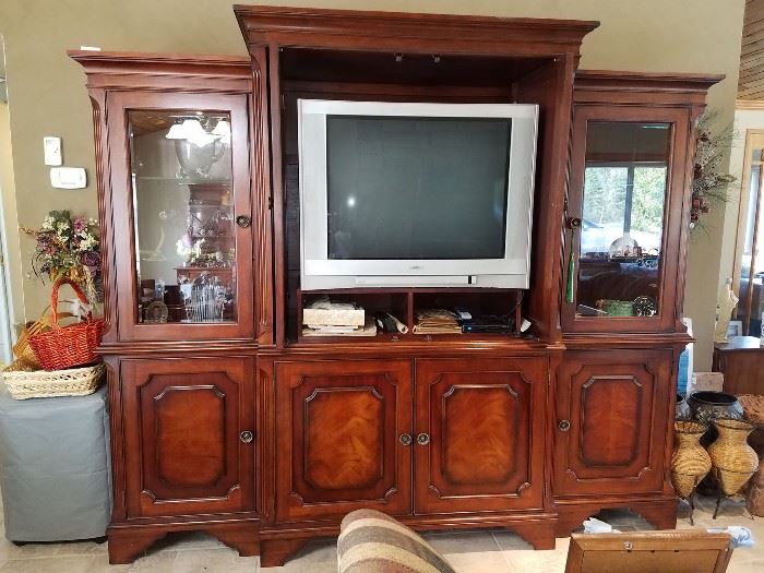 Gorgeous solid wood media cabinet. Can be split up. Lower center part can also act as a buffet