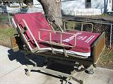 Stryker Motorized hospital bed with mattress.