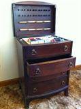 Four drawer Sewing chest with lift up lid, Includes wooden notions tray. Lid contains thread storage. C. 1950