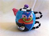 Hand painted cat teapot with cup below. Unique