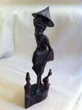 Statue of oriental man with bag and geese / birds at his feet. Unique