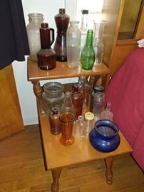 vintage bottles, tiered night table