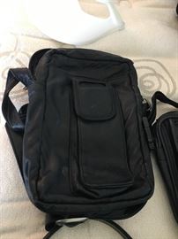 Loads of Womens Purses and Back packs with names such as Borgo Giovanni, Sharper Image, Dooney and Bourke, and of course Coach