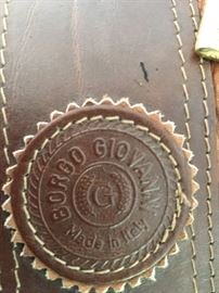 Loads of Womens Purses and Back packs with names such as Borgo Giovanni, Sharper Image, Dooney and Bourke, and of course Coach