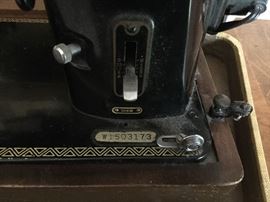 Cased sewing machine is a Singer Featherweight 301W