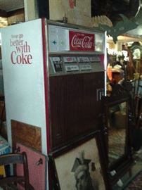 COKE MACHINE HOLDS CANS. $395.00